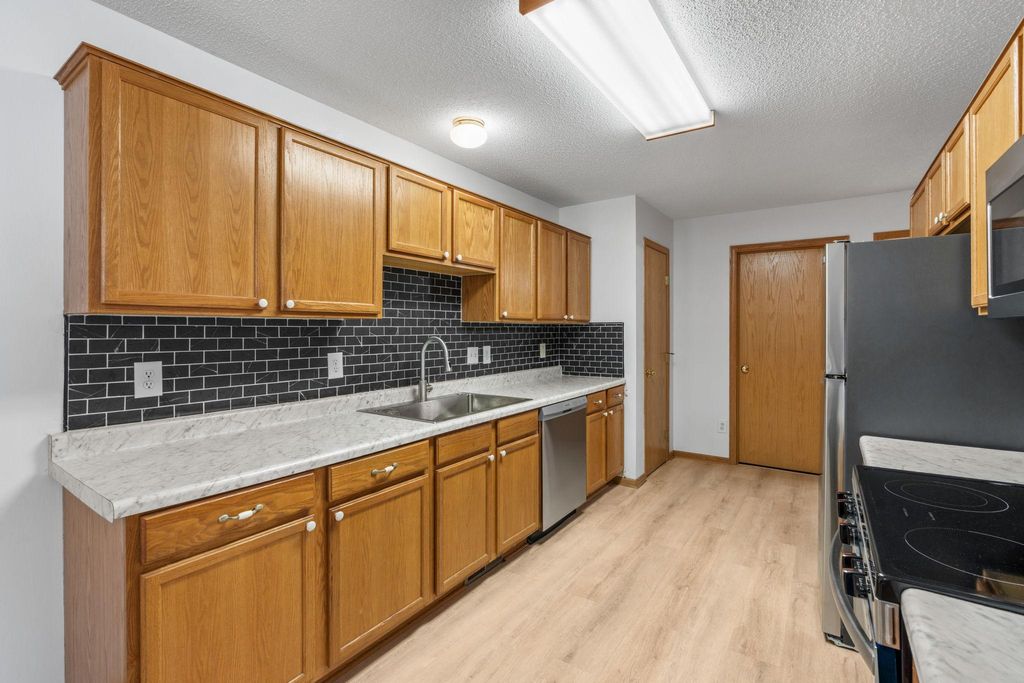 Photo of 8805 Hastings Circle NE, Blaine, MN 55449 (MLS # 7056974)