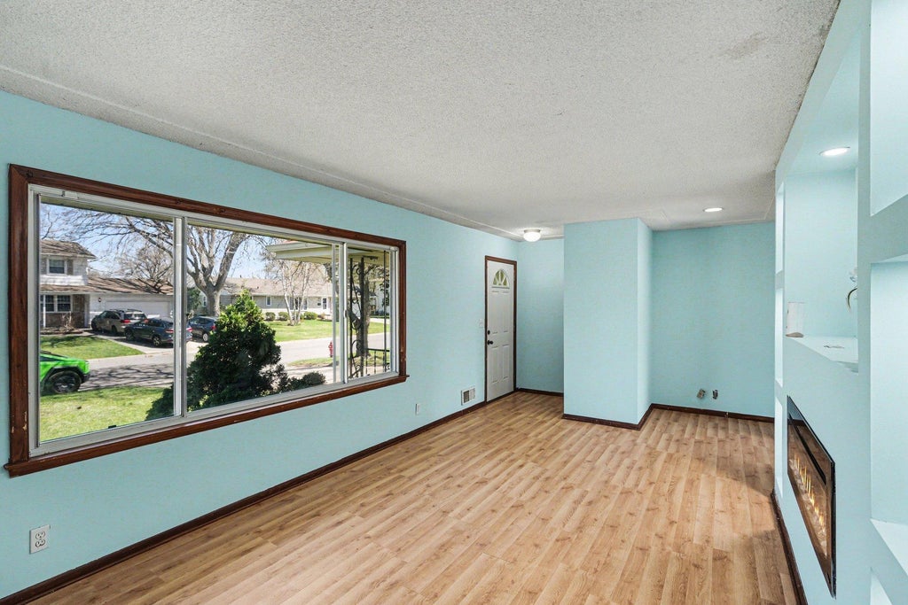 Photo of 7617 Lee Avenue N, Brooklyn Park, MN 55443 (MLS # 7106382)