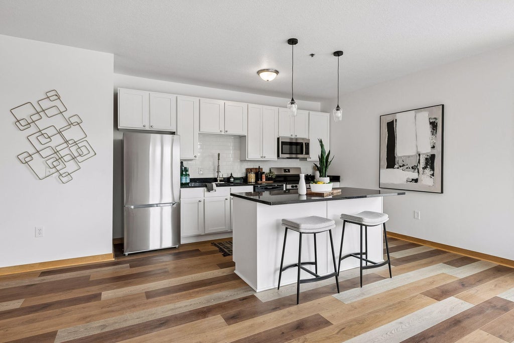 Photo of 1502 5th Street N #313, Hopkins, MN 55305 (MLS # 7106048)