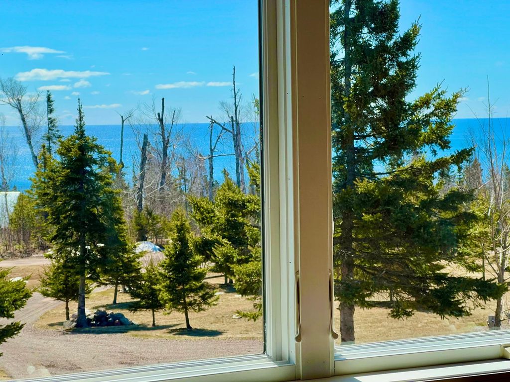Photo of 21 Turnagain Trail, Lutsen, MN 55612 (MLS # 7061621)
