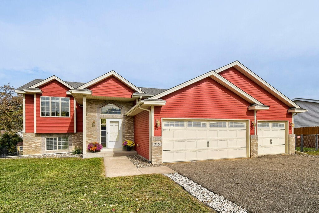 Photo of 713 122nd Avenue NW, Coon Rapids, MN 55448 (MLS # 7155989)