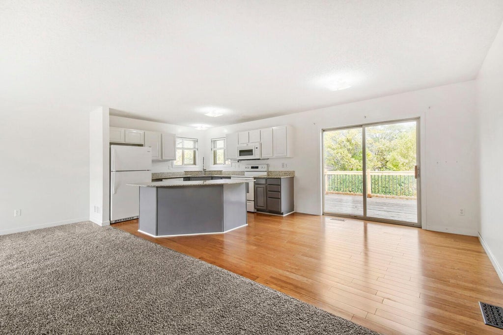 Photo of 713 122nd Avenue NW, Coon Rapids, MN 55448 (MLS # 7155989)