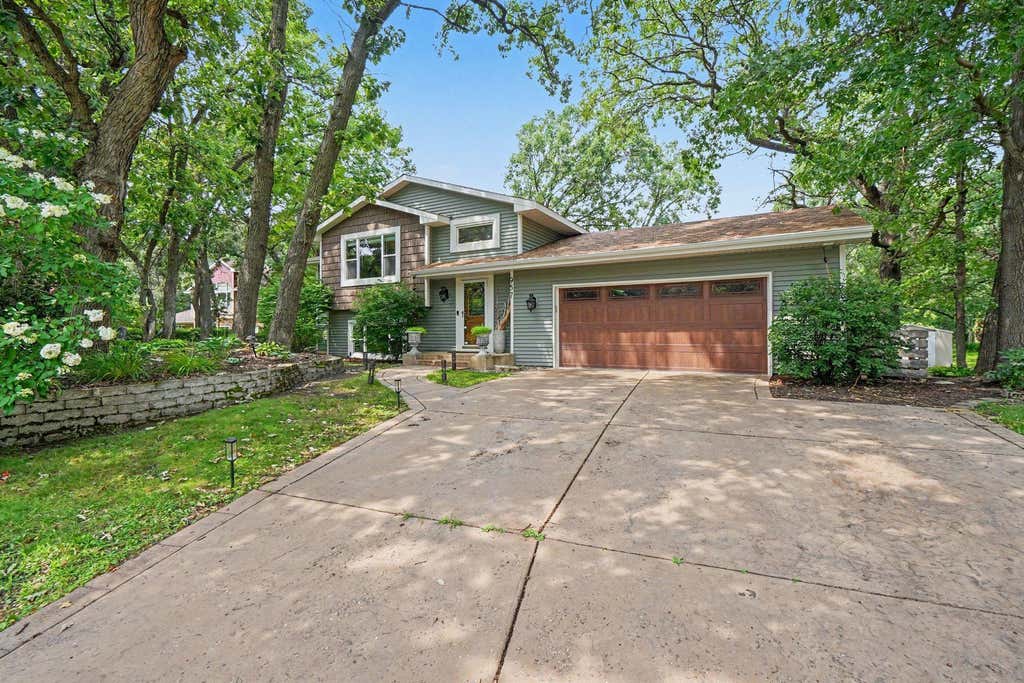 Photo of 957 118th Lane NW, Coon Rapids, MN 55448 (MLS # 7119878)