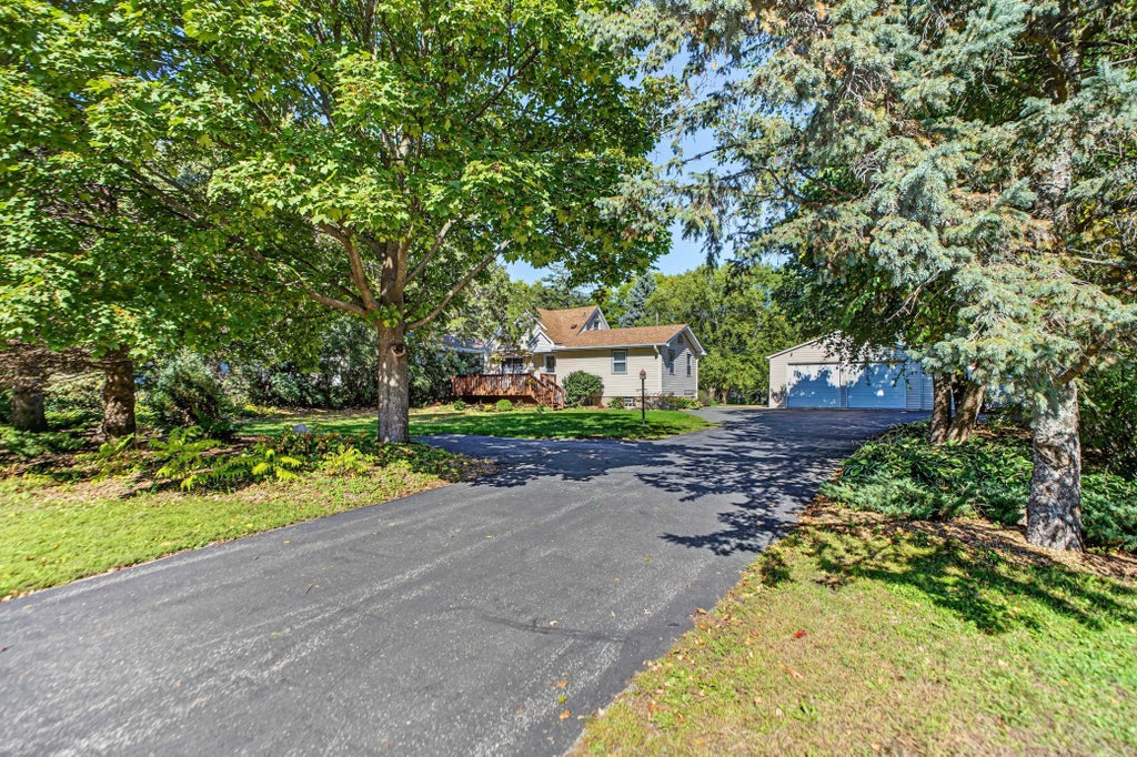 Photo of 7918 Stillwater Boulevard N, Oakdale, MN 55128 (MLS # 7151505)