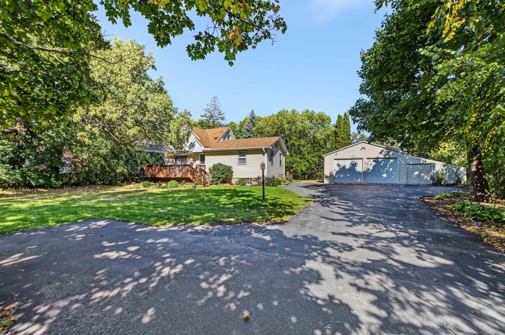 Photo of 7918 Stillwater Boulevard N, Oakdale, MN 55128 (MLS # 7151505)