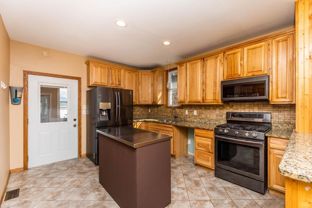 Photo of 2411 Madison Street NE, Minneapolis, MN 55418 (MLS # 7040880)