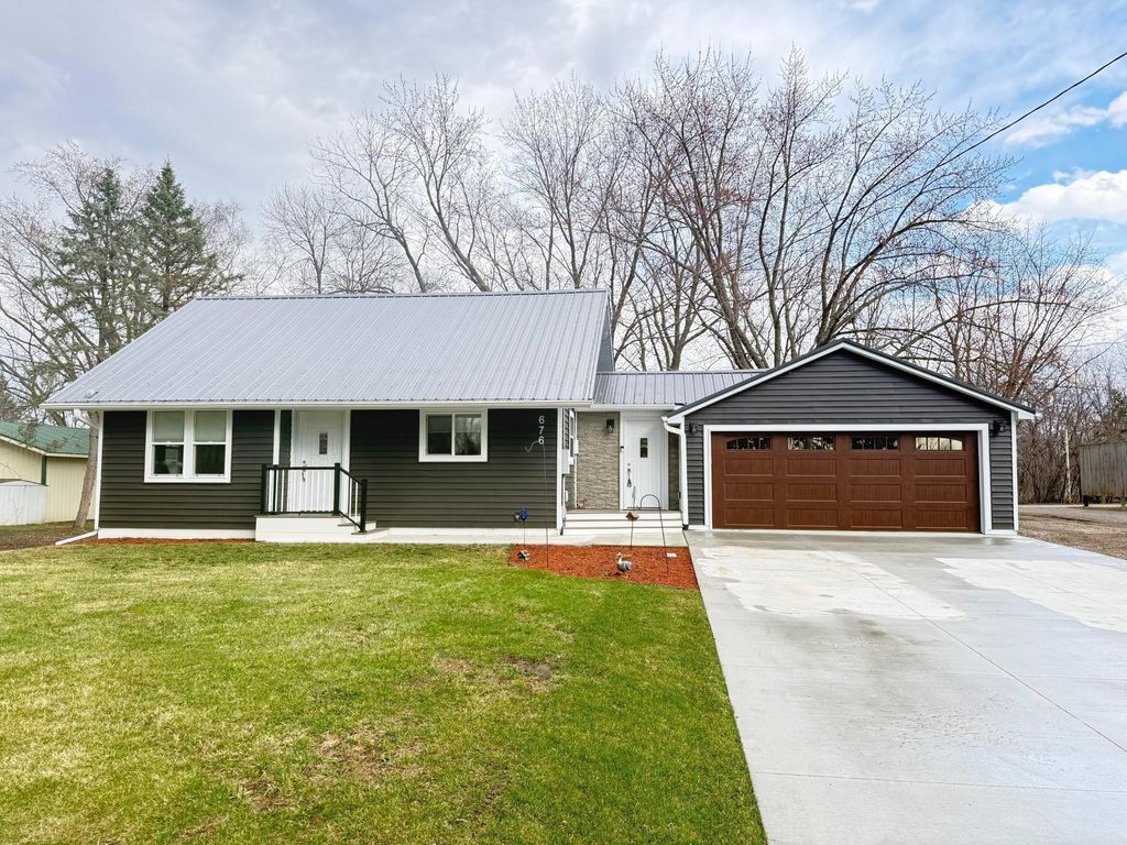 Photo of 676 State Street N, Eden Valley, MN 55329 (MLS # 7053689)