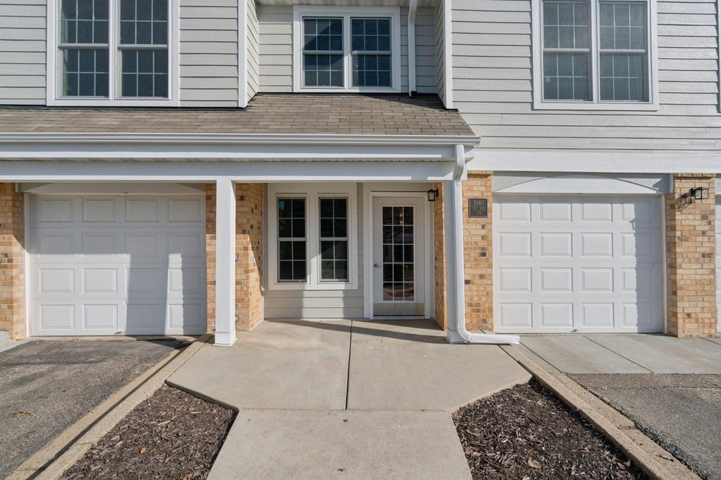 Photo of 5980 Chasewood Parkway #102, Minnetonka, MN 55343 (MLS # 7032702)