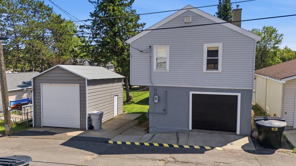 Photo of 216 1st St SW ST, Chisholm, MN 55719 (MLS # 7105783)