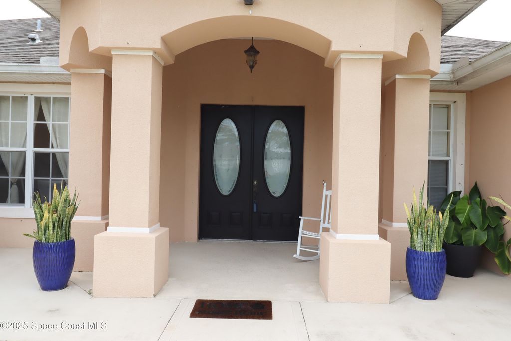 Photo of 292 Hoffer Avenue NW, Palm Bay, FL 32907 (MLS # 1057087)