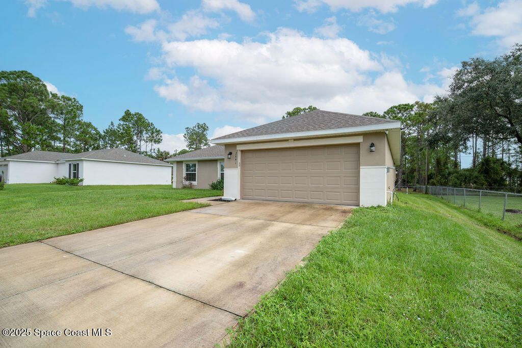 Photo of 2641 Palmer Avenue SE, Palm Bay, FL 32909 (MLS # 1058962)