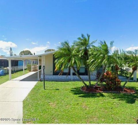 719 Wedelia Drive Barefoot Bay FL 32976