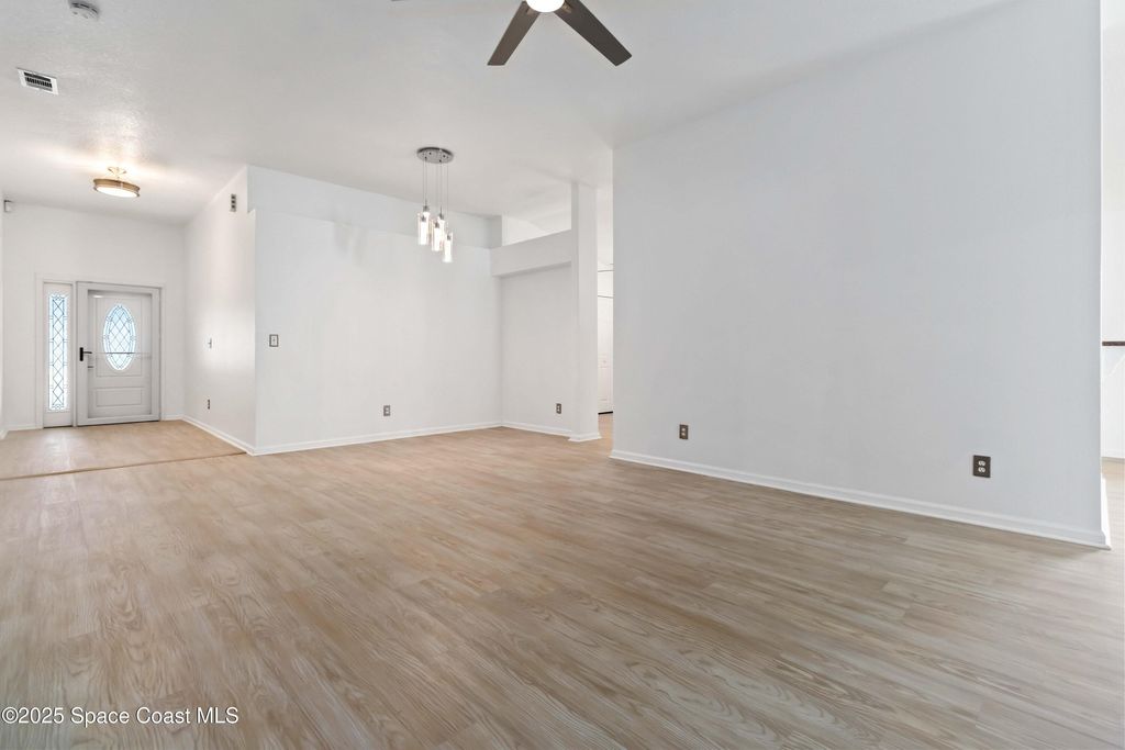 Photo of 377 Wishing Well Circle SW, Palm Bay, FL 32908 (MLS # 1058898)