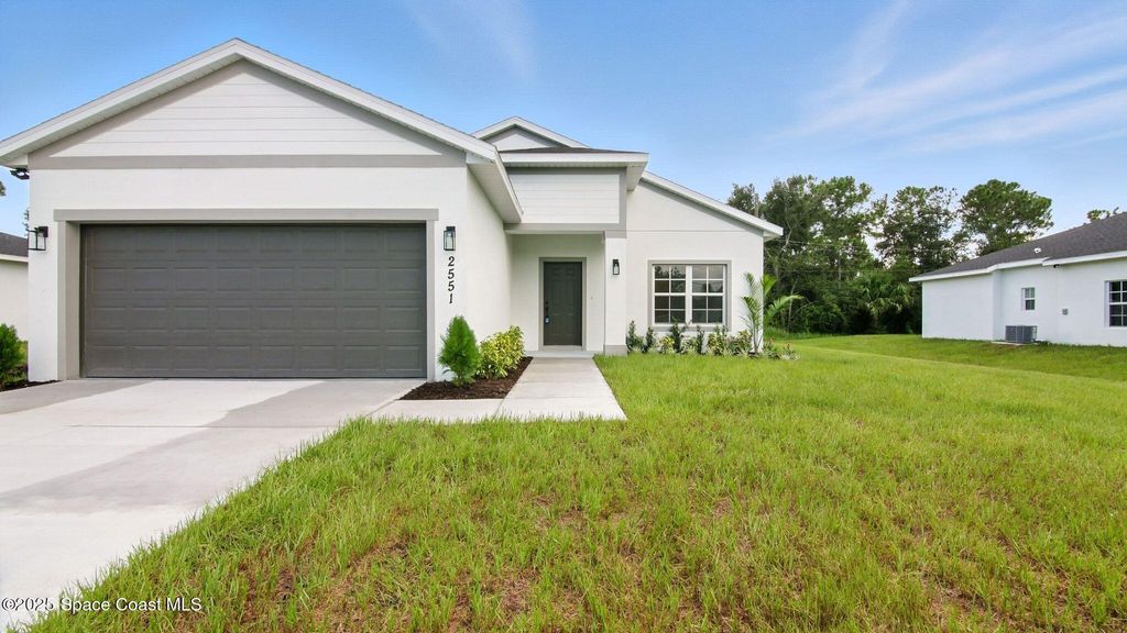 Photo of 2551 San Filippo Drive SE, Palm Bay, FL 32909 (MLS # 1055681)
