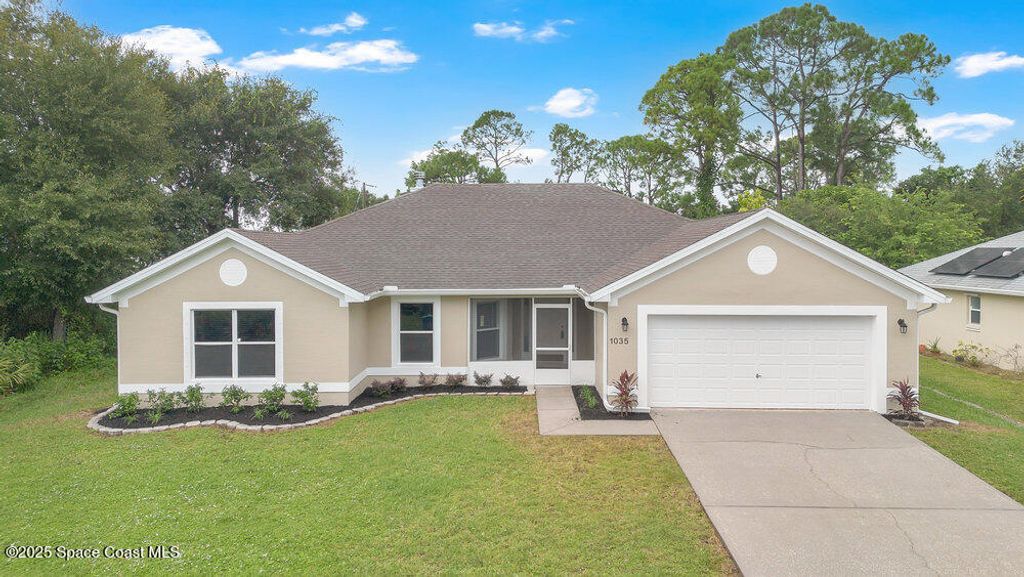 Photo of 1035 Utah Street SE, Palm Bay, FL 32909 (MLS # 1059060)