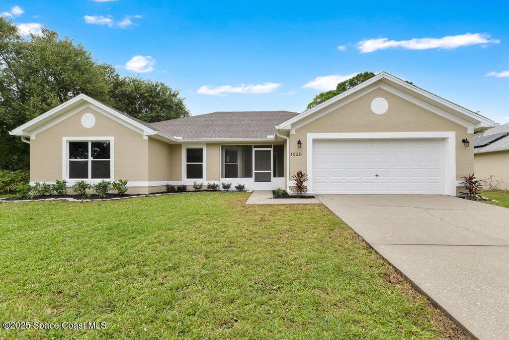 Photo of 1035 Utah Street SE, Palm Bay, FL 32909 (MLS # 1059060)