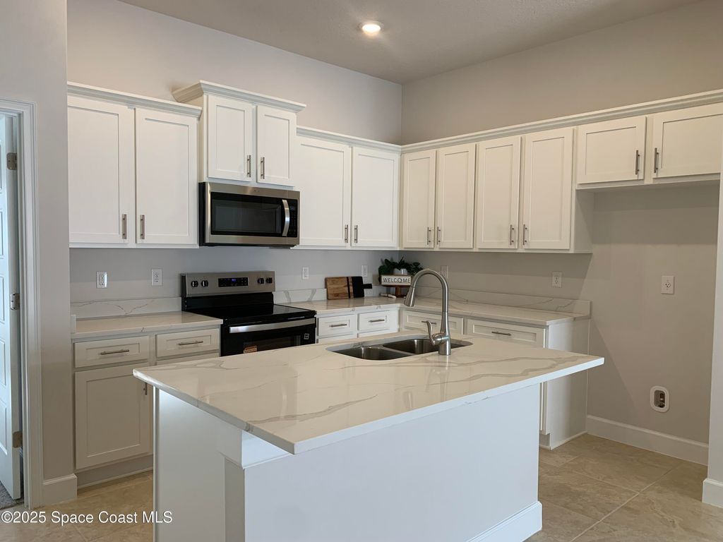 Photo of 1686 Kylar Drive NW, Palm Bay, FL 32907 (MLS # 1058252)