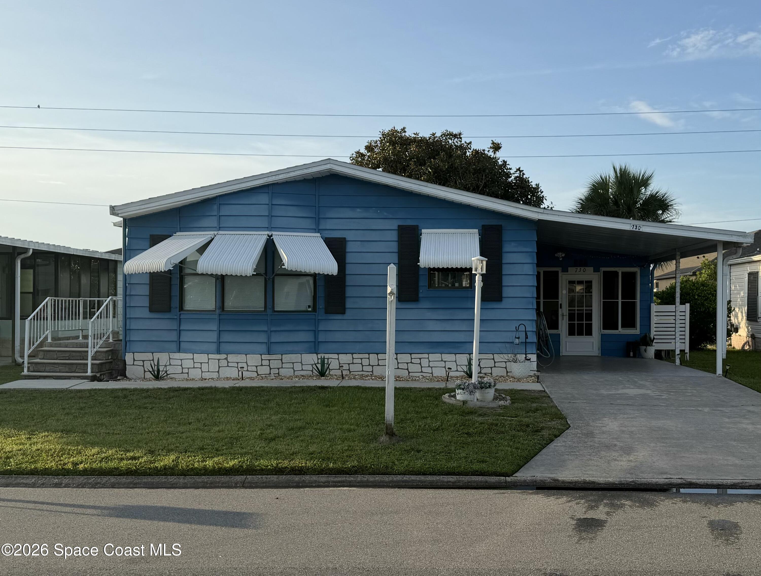 Photo 1 of 63 — 730 Periwinkle Circle, Barefoot Bay, FL 32976