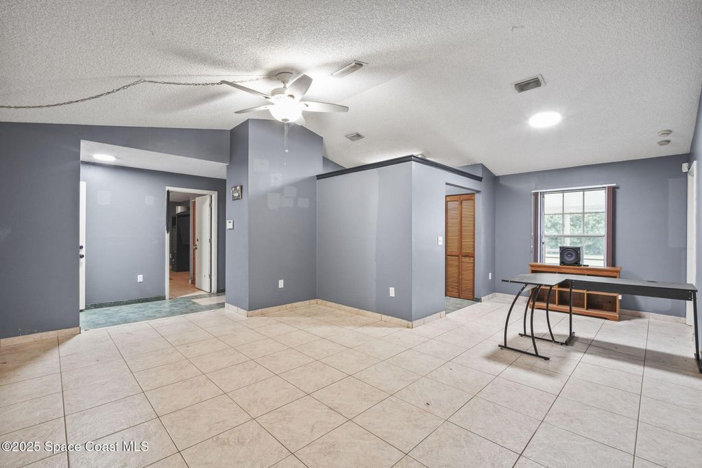 Photo of 627 Firestone Street NE, Palm Bay, FL 32907 (MLS # 1057704)