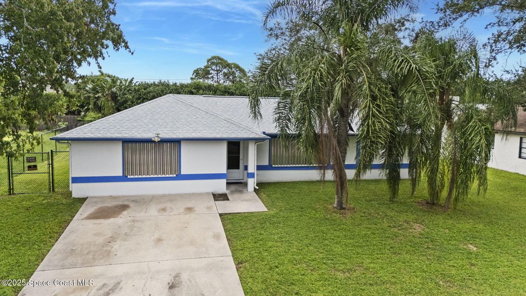 Photo of 627 Firestone Street NE, Palm Bay, FL 32907 (MLS # 1057704)