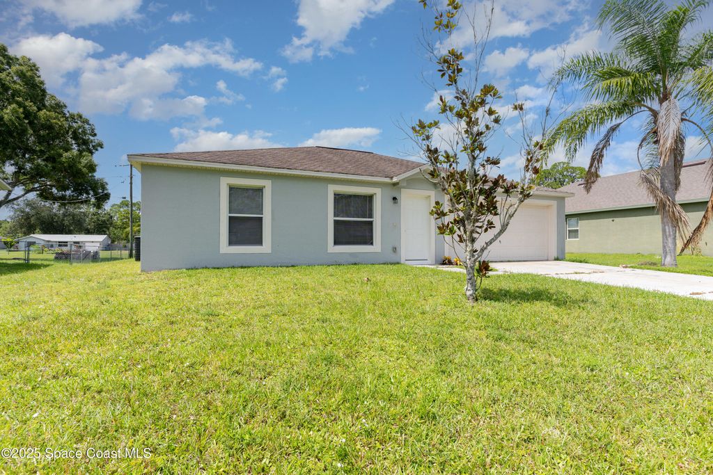 Photo of 774 Fletcher Road SE, Palm Bay, FL 32909 (MLS # 1057477)