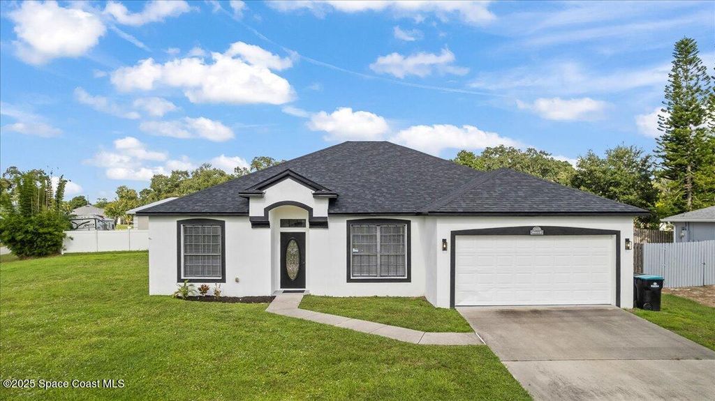 Photo of 269 Olivick Circle NE, Palm Bay, FL 32907 (MLS # 1058120)