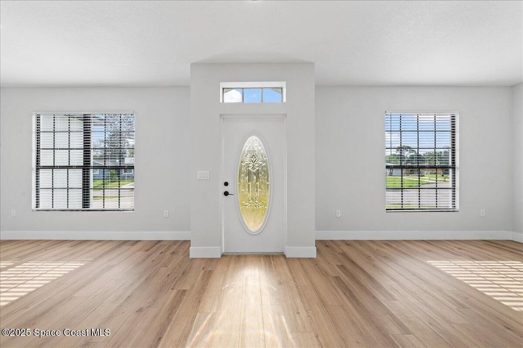Photo of 269 Olivick Circle NE, Palm Bay, FL 32907 (MLS # 1058120)