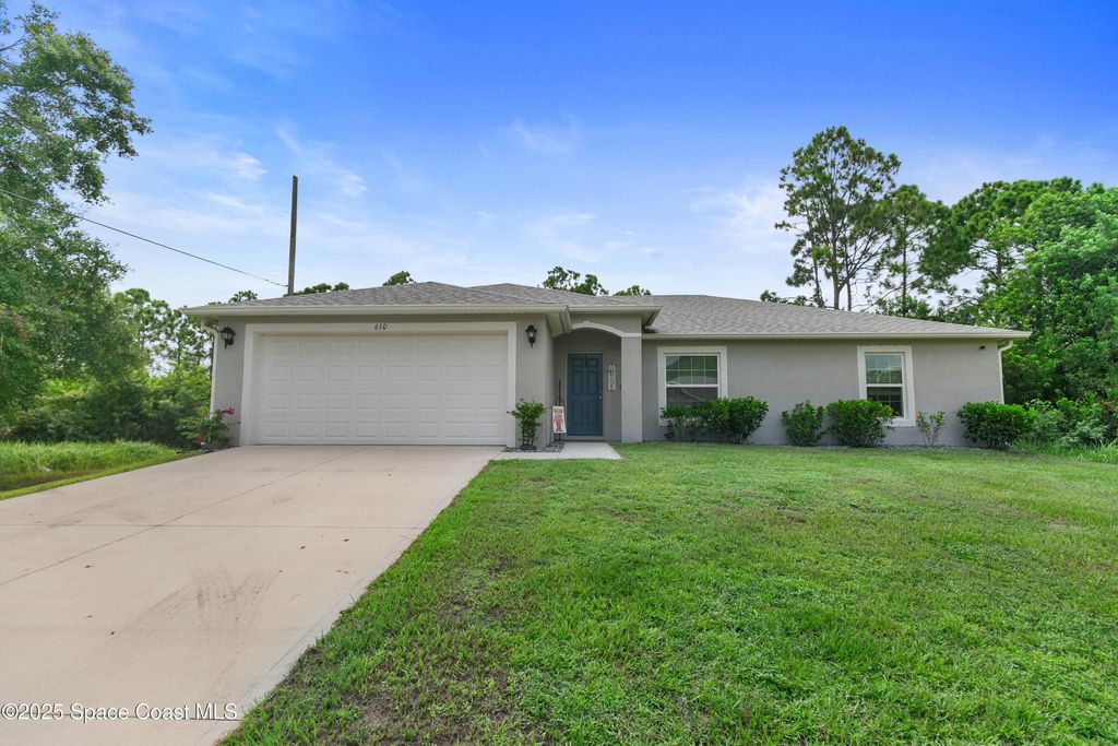 Photo of 610 Wildmer Road SW, Palm Bay, FL 32908 (MLS # 1056345)