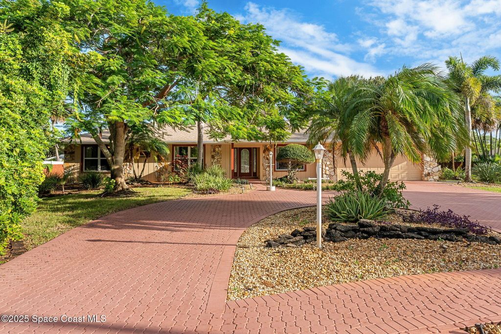 Photo of 4 Colonial Way, Indian Harbour Beach, FL 32937 (MLS # 1059981)