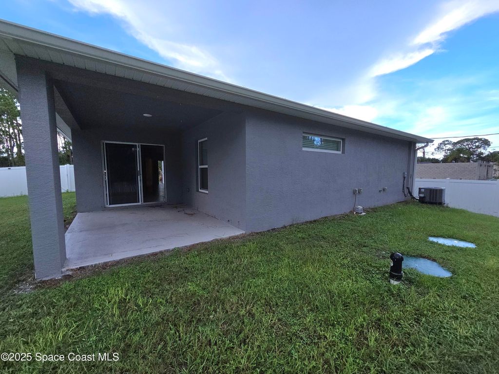 Photo of 259 Webbwood Avenue SW, Palm Bay, FL 32908 (MLS # 1056304)