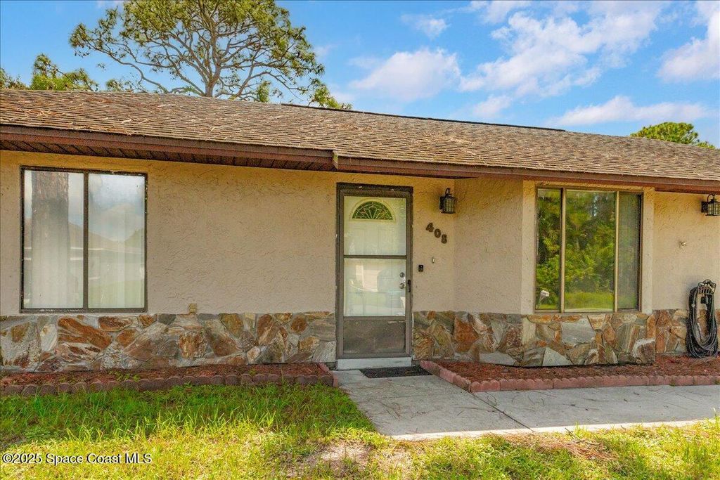 Photo of 408 Australian Road NW, Palm Bay, FL 32907 (MLS # 1055745)