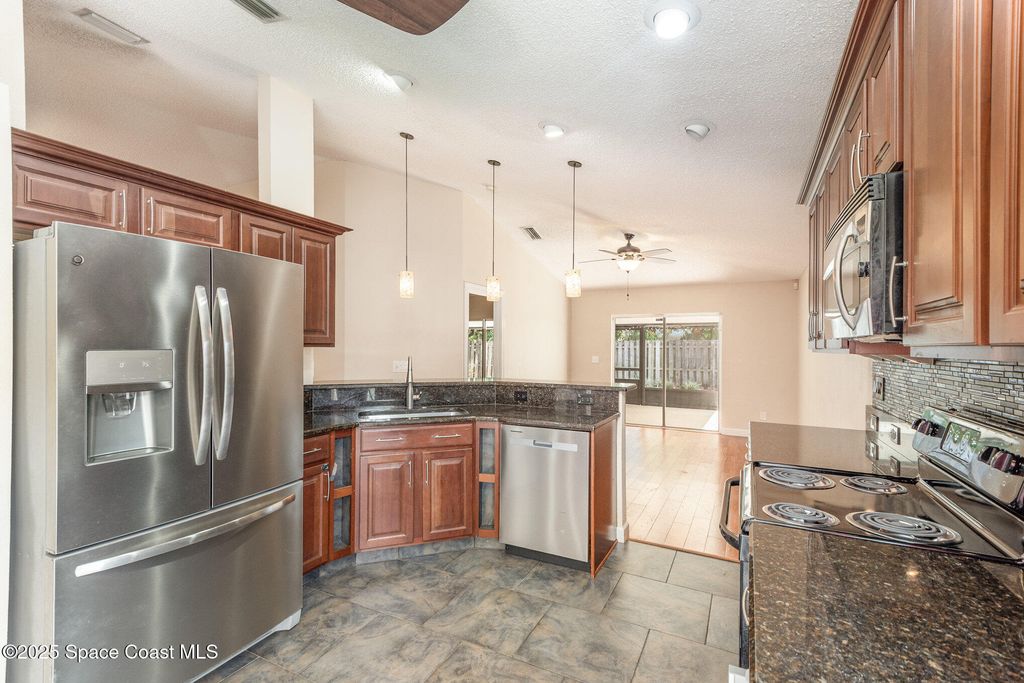 Photo of 4491 Derbyshire Drive, Titusville, FL 32780 (MLS # 1060301)