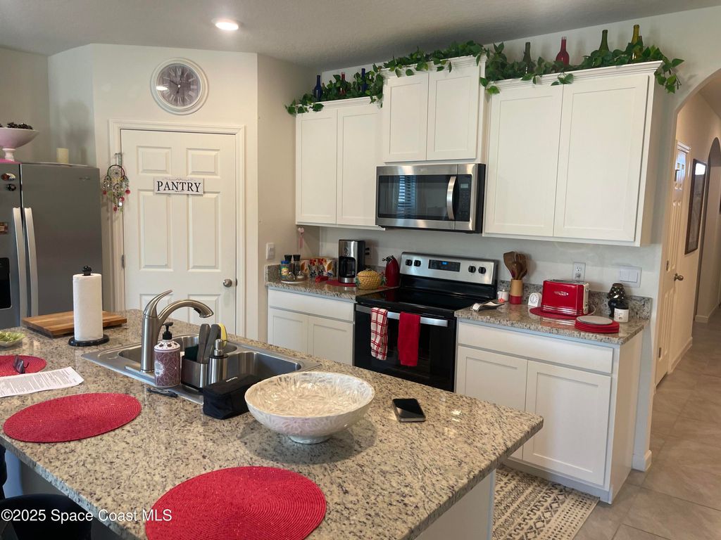 Photo of 939 Remington Green Drive SE, Palm Bay, FL 32909 (MLS # 1057224)