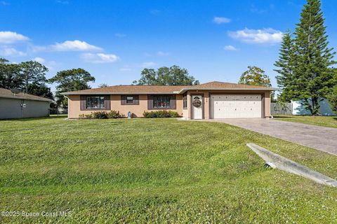 Photo of 772 Aragon Avenue NE, Palm Bay, FL 32905 (MLS # 1064665)