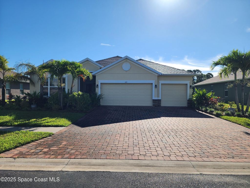 Photo of 676 Stonebriar Drive SE, Palm Bay, FL 32909 (MLS # 1058360)