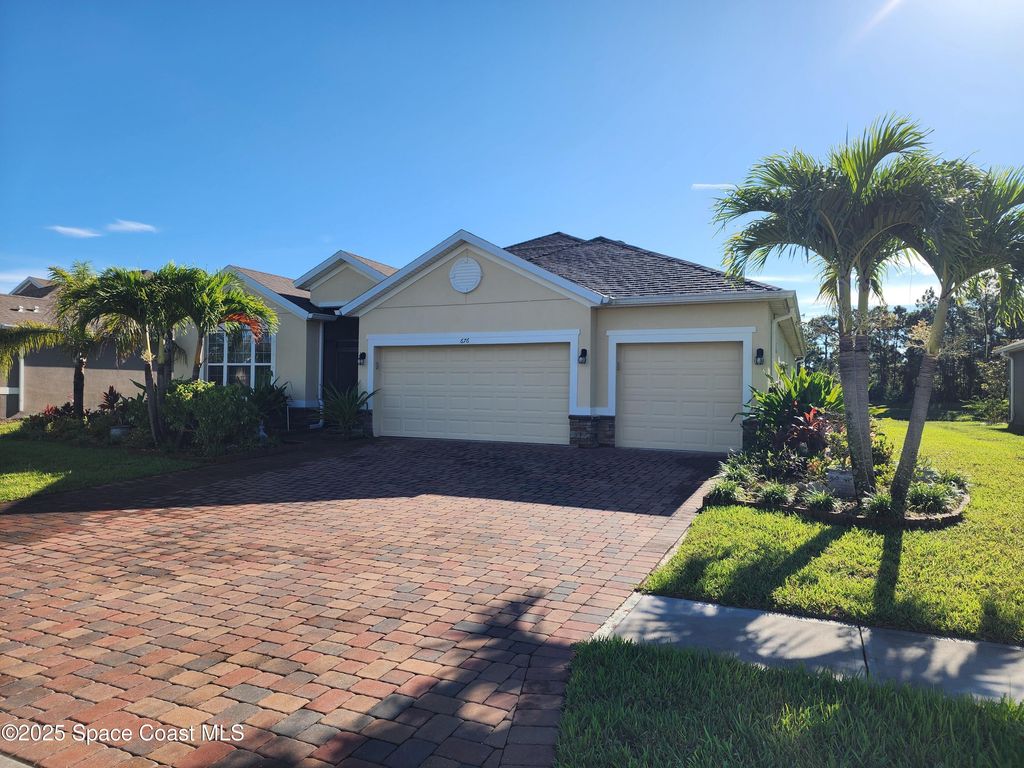 Photo of 676 Stonebriar Drive SE, Palm Bay, FL 32909 (MLS # 1058360)
