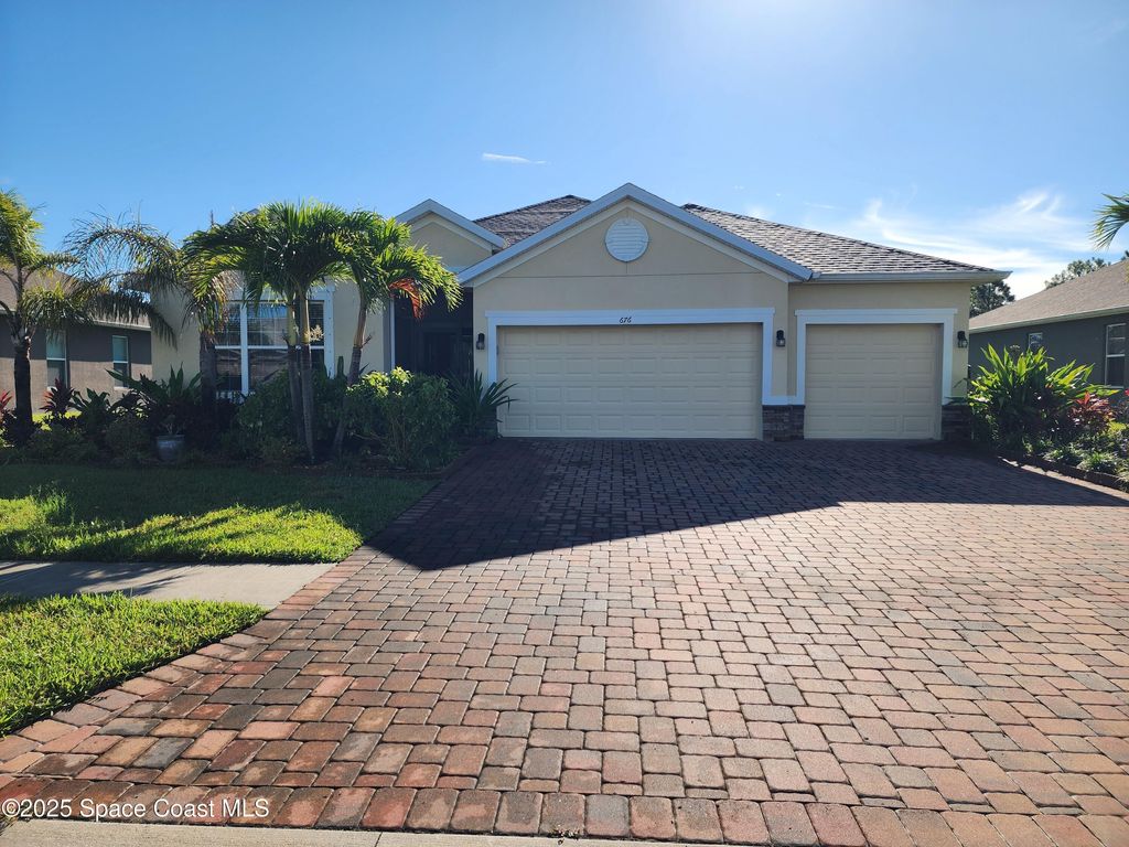 Photo of 676 Stonebriar Drive SE, Palm Bay, FL 32909 (MLS # 1058360)