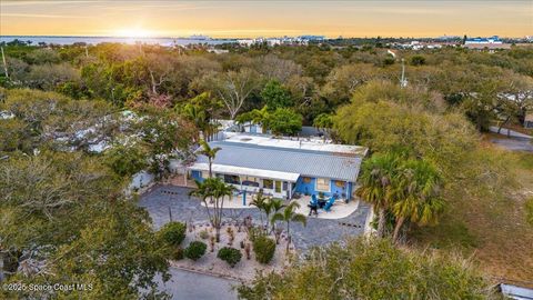 Photo of 126 W Alachua Lane, Cocoa Beach, FL 32931 (MLS # 1069169)