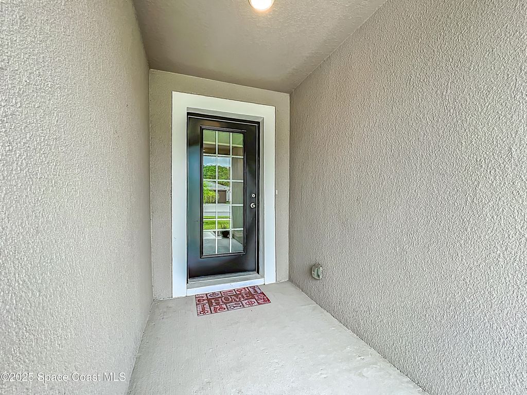 Photo of 1115 Corbin Circle SW, Palm Bay, FL 32908 (MLS # 1057683)