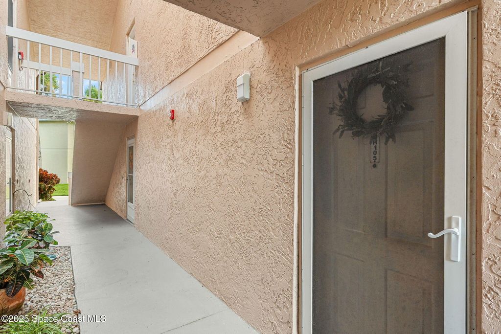 Photo of 945 Sonesta Avenue NE #105, Palm Bay, FL 32905 (MLS # 1059082)