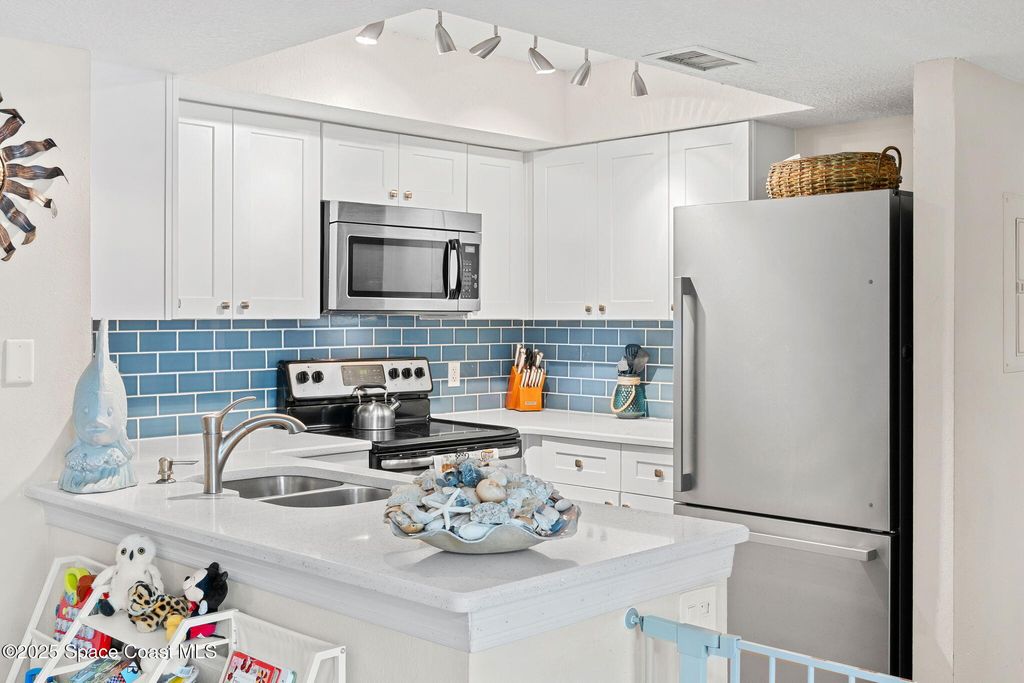 Photo of 945 Sonesta Avenue NE #105, Palm Bay, FL 32905 (MLS # 1059082)
