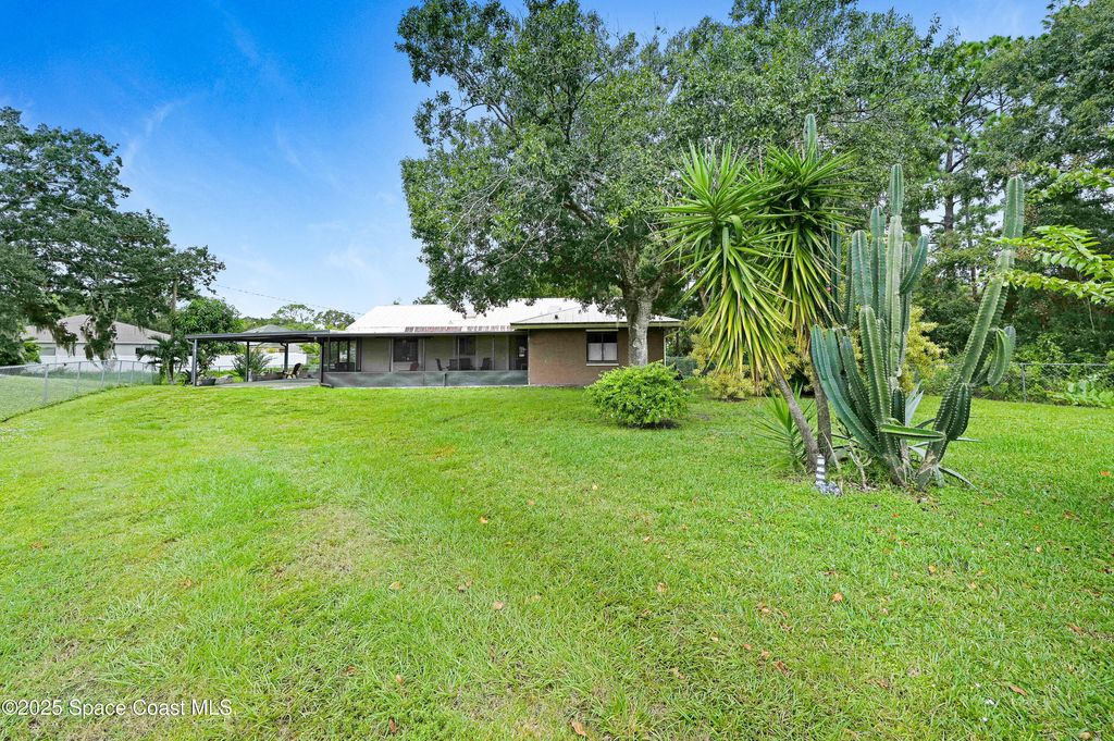 Photo of 1078 Grapefruit Road SE, Palm Bay, FL 32909 (MLS # 1059075)