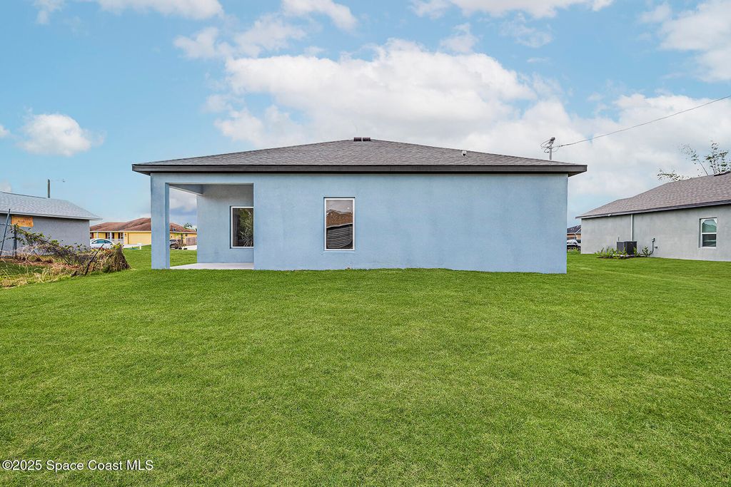 Photo of 307 Hammonton Street SW, Palm Bay, FL 32908 (MLS # 1056835)