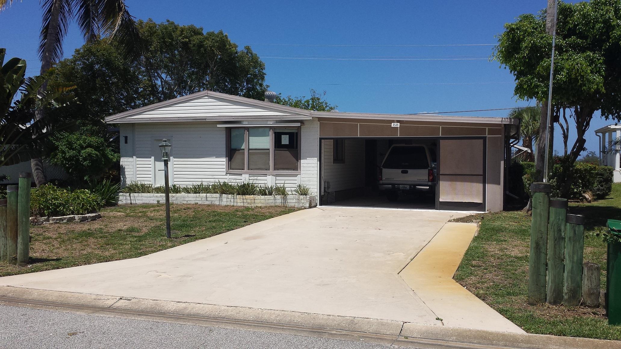 Photo 1 of 14 — 7535 Agawam Road, Micco, FL 32976