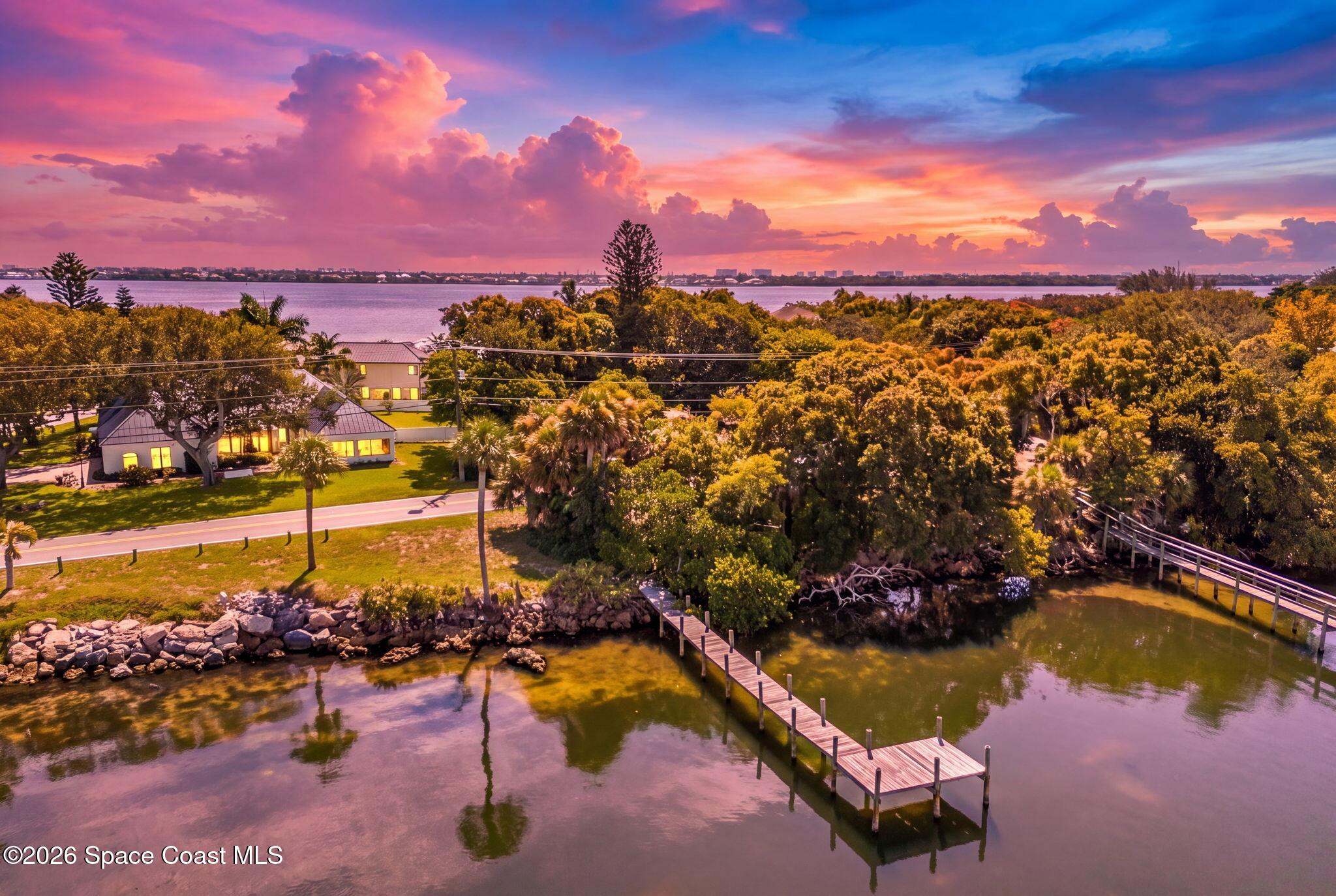 Photo 1 of 59 — 9400 S Tropical Trail, Merritt Island, FL 32952