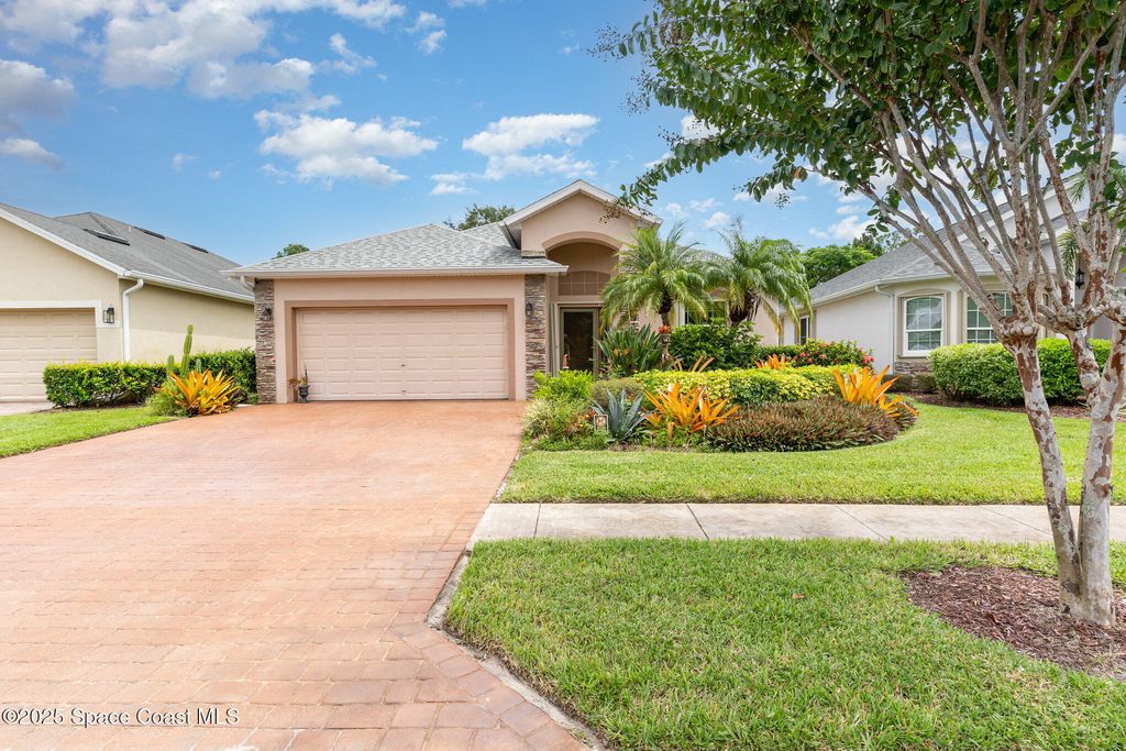Photo of 665 Remington Green Drive SE, Palm Bay, FL 32909 (MLS # 1057059)