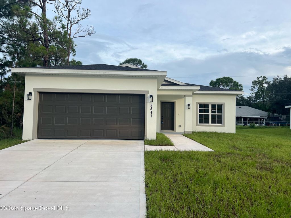 Photo of 2541 San Filippo Drive SE, Palm Bay, FL 32909 (MLS # 1055682)
