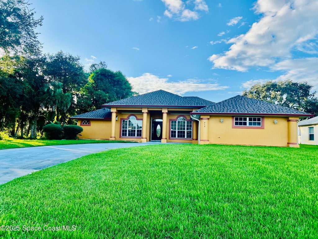 Photo of 317 Lanack Road SE, Palm Bay, FL 32909 (MLS # 1057650)