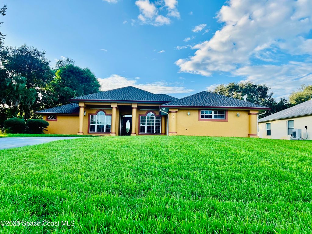Photo of 317 Lanack Road SE, Palm Bay, FL 32909 (MLS # 1057650)