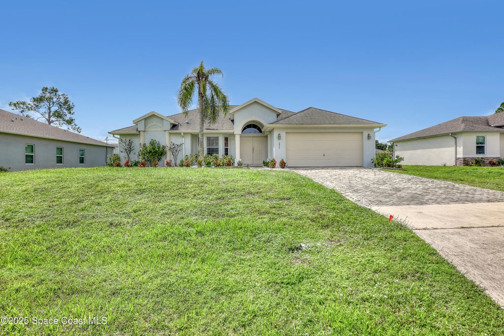 Photo of 1856 Fairlight Street NW, Palm Bay, FL 32907 (MLS # 1056955)